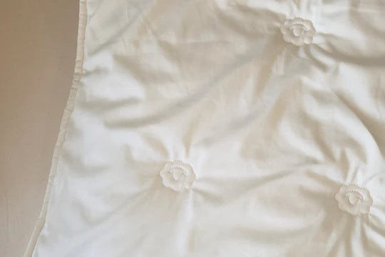 Organic toddler wool comforter for baby by Holy Lamb Organics, soft and cozy with natural wool filling and gentle fabric.