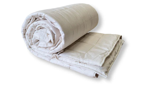 Soaring Heart quilted cotton comforter with a soft, textured fabric in a cozy, inviting bedroom setting.