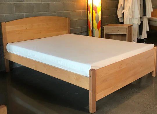 Holy Lamb Organics wool and latex mattress, 6.5-inch thick, with a plush, natural fabric cover and supportive foam interior.