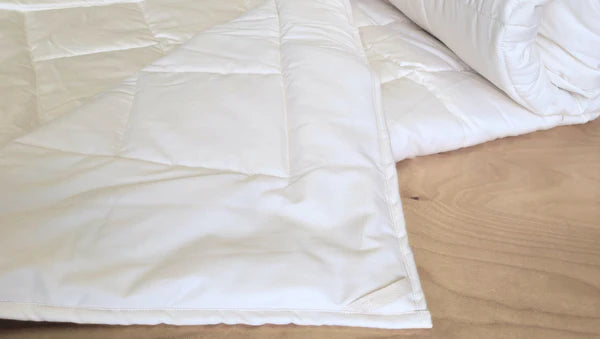 Soaring Heart quilted cotton comforter with a soft, textured surface and cozy design, perfect for adding comfort to your bed.