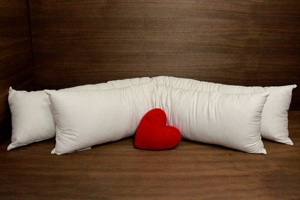 Organic body pillow from Soaring Heart featuring soft, plush fabric and ergonomic design for comfortable full-body support.