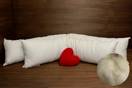 Organic body pillow by Soaring Heart with soft, plush fabric, featuring a rounded shape and cozy wool filling for comfort and support.