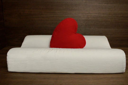Ergonomic organic latex pillow by Soaring Heart, showing a contoured pillow with a soft, breathable cover for comfortable sleep.