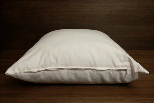 Organic Wool Pillows by Soaring Heart with plush, natural wool filling, showcasing the soft, firm texture of the pillows.