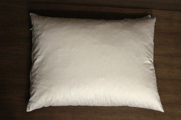 Shredded latex pillows by Soaring Heart, showing soft, breathable shredded latex filling in a close-up view.