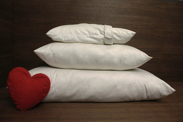 Shredded latex pillows by Soaring Heart, showing soft, breathable shredded latex filling inside a pillow cover.