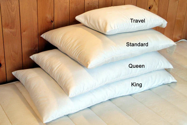 Organic wool bed pillow from Holy Lamb Organics, showing the plush, natural wool filling and soft fabric cover in various sizes.