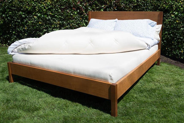 Royal Organic Latex and Wool Mattress Topper by Soaring Heart, showing plush, eco-friendly bedding with natural latex and wool layers.