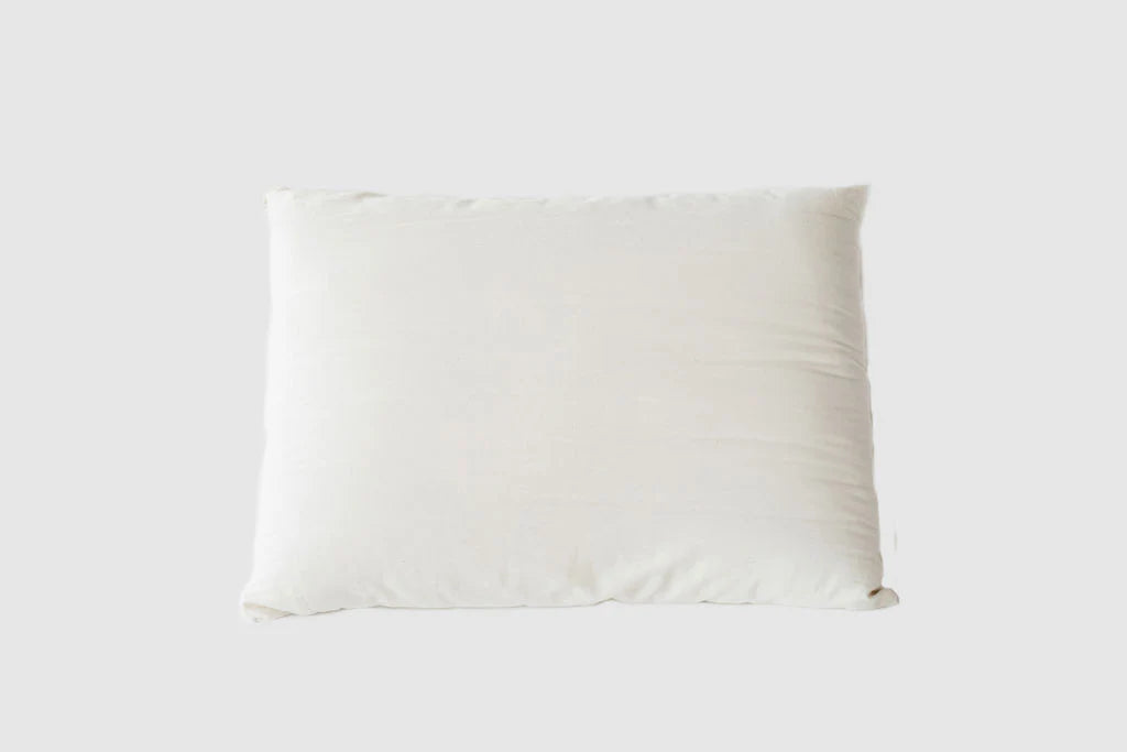 Natural wool-wrapped latex bed pillow by Holy Lamb Organics, showing a plush, supportive pillow with a soft, cozy cover.